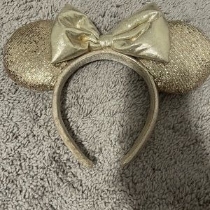 Gold sequence disney park Minnie Mouse ears